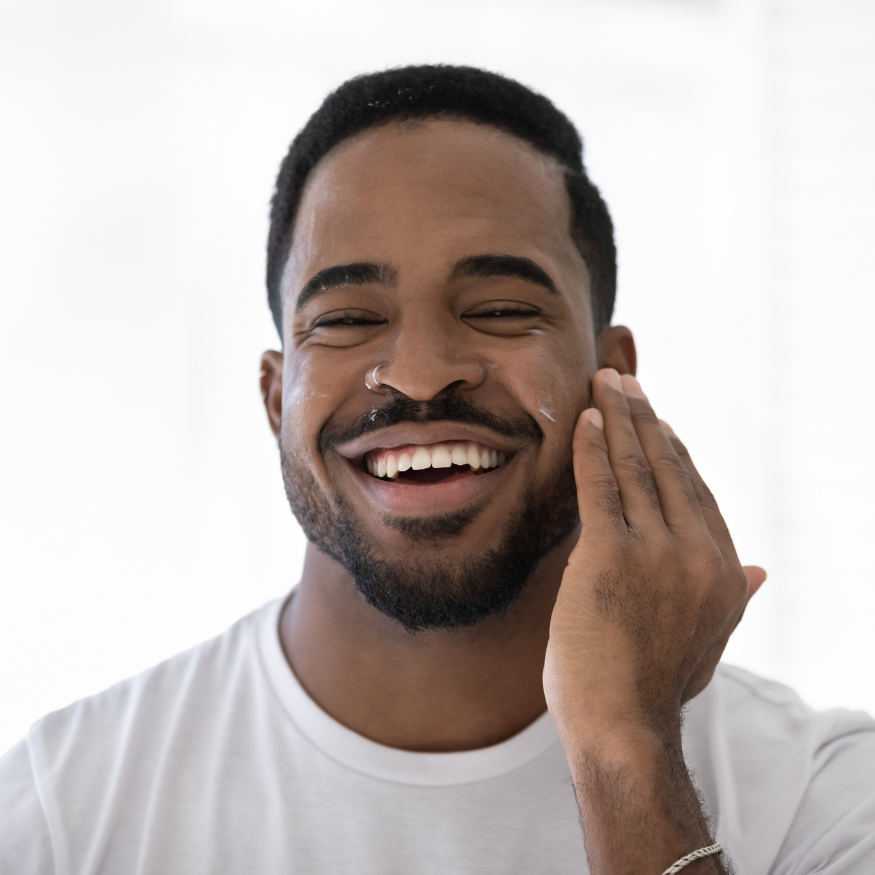 
                      
                        Eonian skincare for men, Soveregin skin balm for aftershave face care. Man applying aftershave cream
                      
                    
